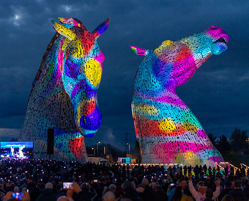 Cunningly Good Group, Perth-based marketing and PR agency – image of the Kelpies lit with colourful projections.