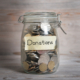 Money jar with donations label.
