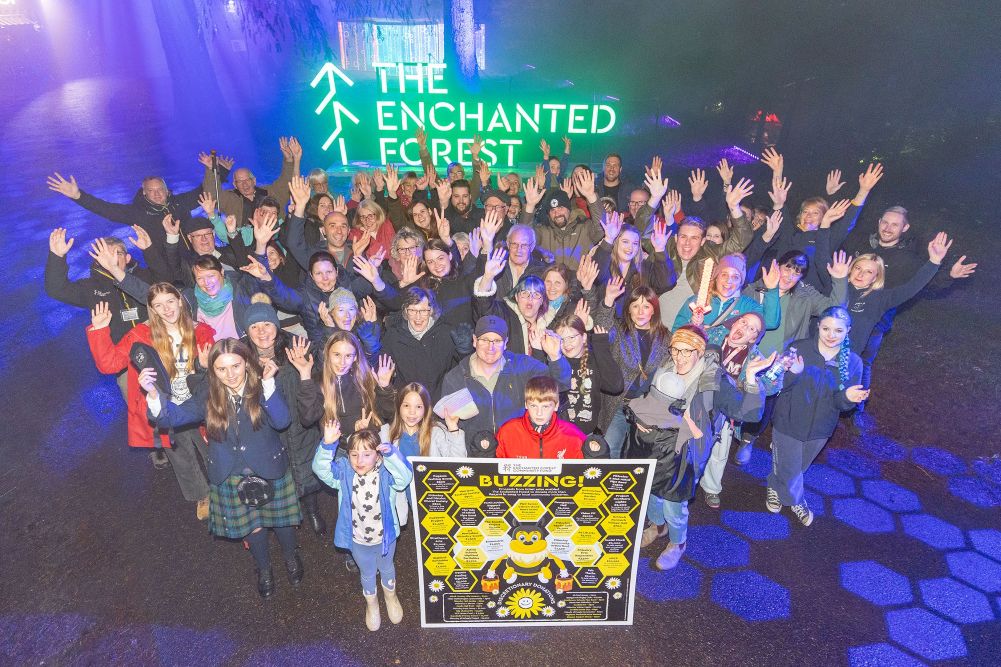 The Enchanted Forest Community Fund 2025 beneficiaries gathered at The Enchanted Forest in Faskally Wood.